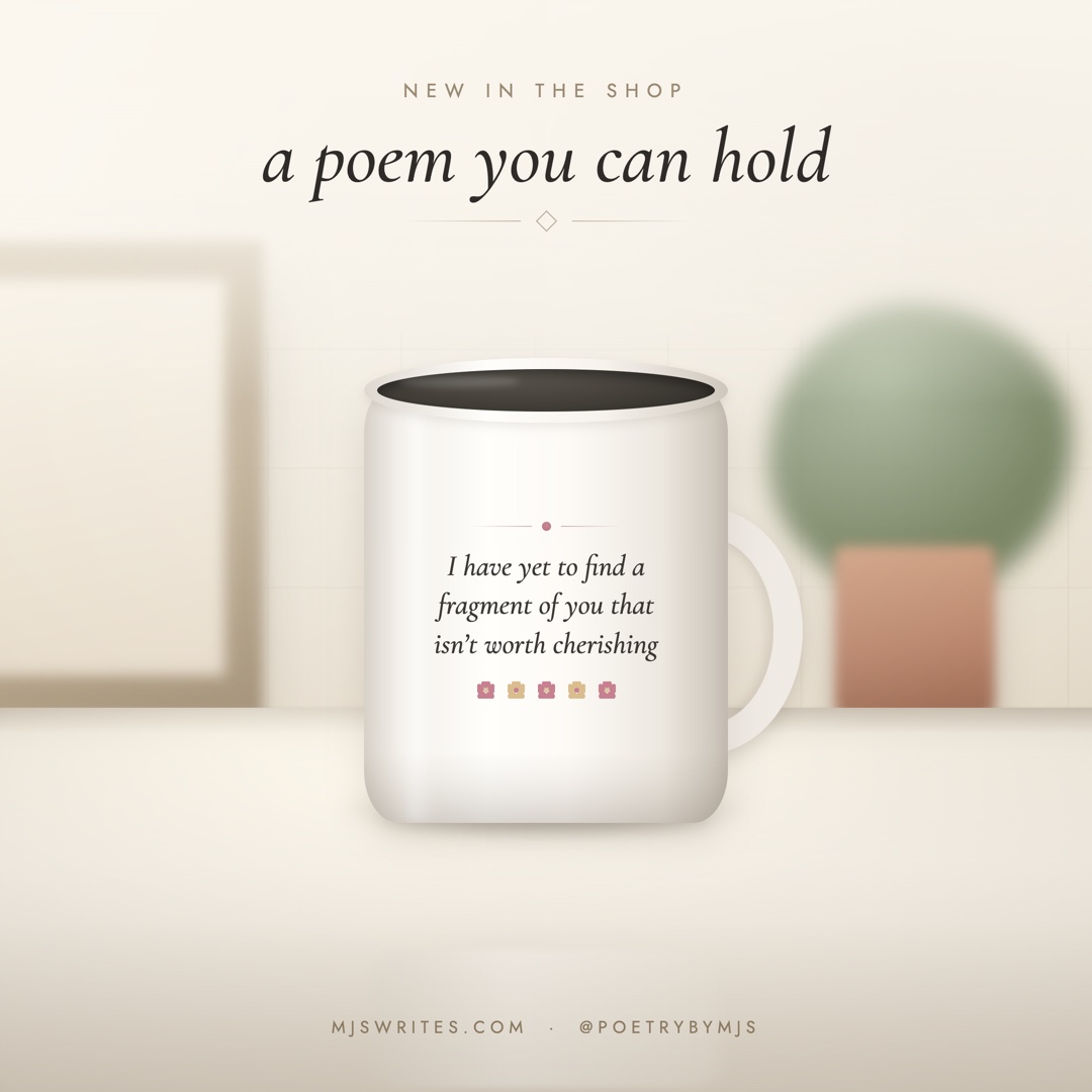 A white ceramic mug printed with the poem line "I have yet to find a fragment of you that isn't worth cherishing"